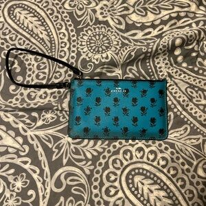 Coach Blue Wristlet with Black Floral Design
